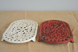 2 Vintage Cast Iron Oval Trivets, Red and White