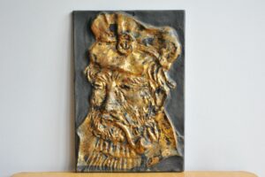 Vintage Cast Iron and Gilded Relief of Pipe Smoking Captain