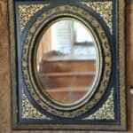 antique french ebonised and gilt wall mirror