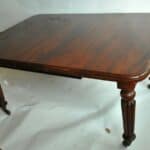 antique mahogany wind out table by edwards and roberts