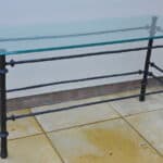 cast metal and glass giacommetti inspired console