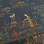 a pair of oriental inspired sidetables