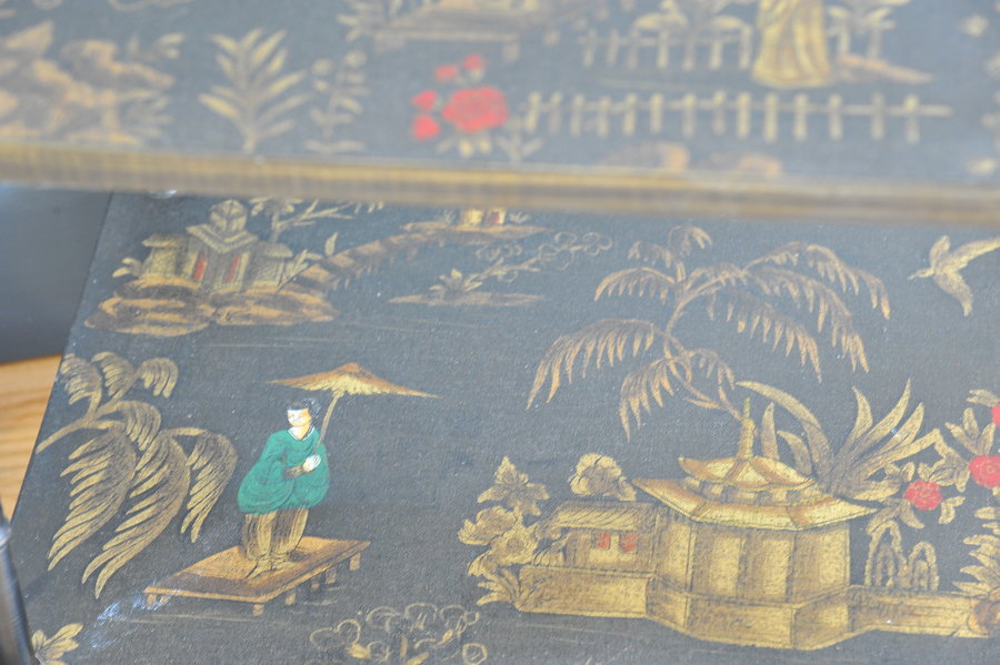 a pair of oriental inspired sidetables