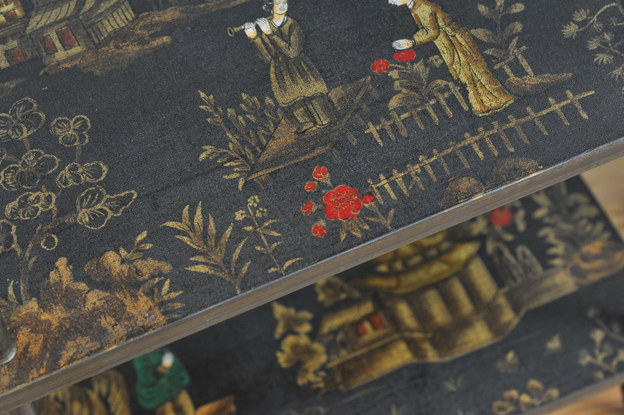 a pair of oriental inspired sidetables
