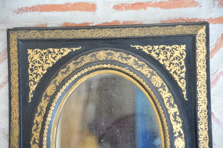 antique french ebonised and gilt wall mirror