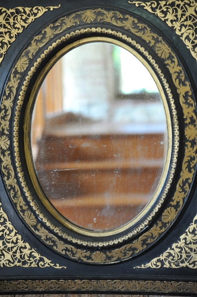 antique french ebonised and gilt wall mirror