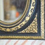 antique french ebonised and gilt wall mirror