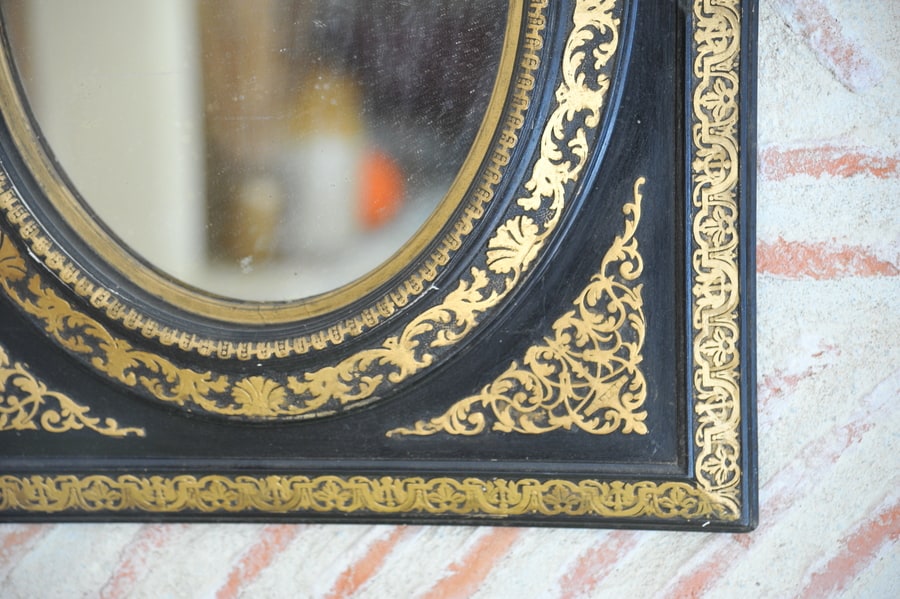 antique french ebonised and gilt wall mirror