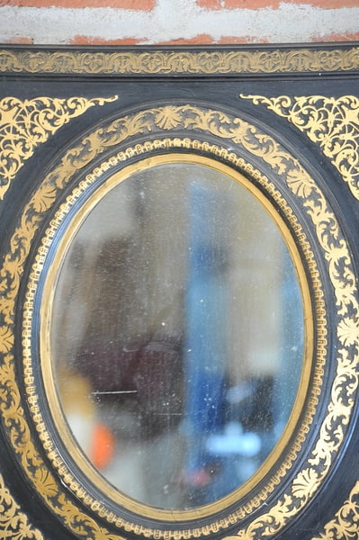 antique french ebonised and gilt wall mirror