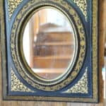 antique french ebonised and gilt wall mirror