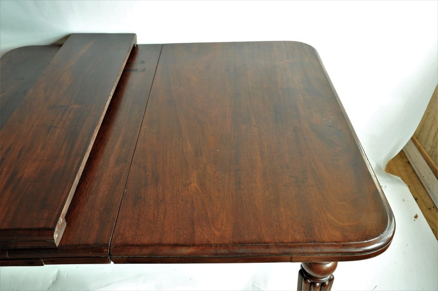 antique mahogany wind out table by edwards and roberts