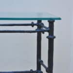 cast metal and glass giacommetti inspired console
