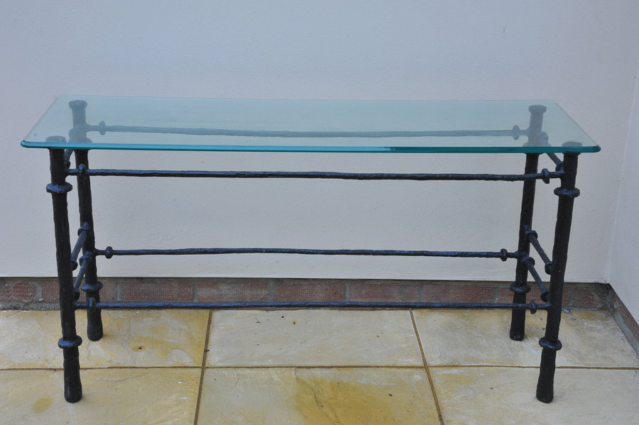 cast metal and glass giacommetti inspired console