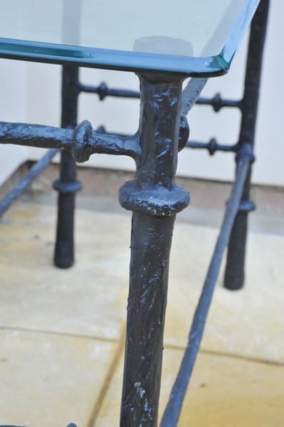 cast metal and glass giacommetti inspired console