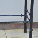 cast metal and glass giacommetti inspired console