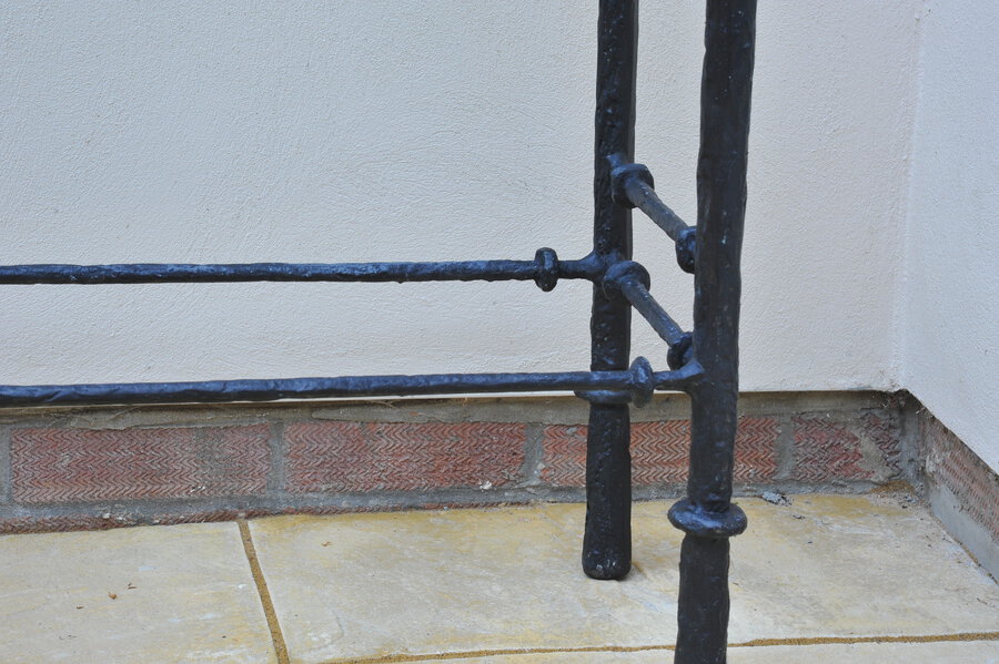 cast metal and glass giacommetti inspired console