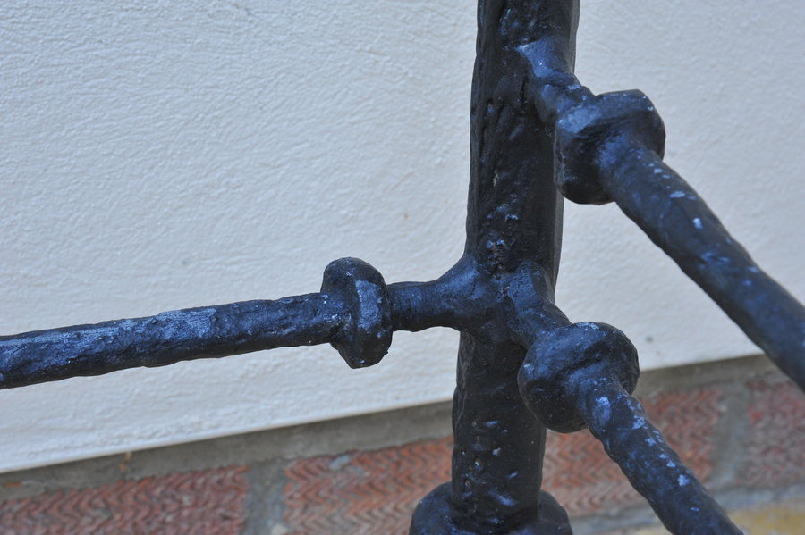 cast metal and glass giacommetti inspired console