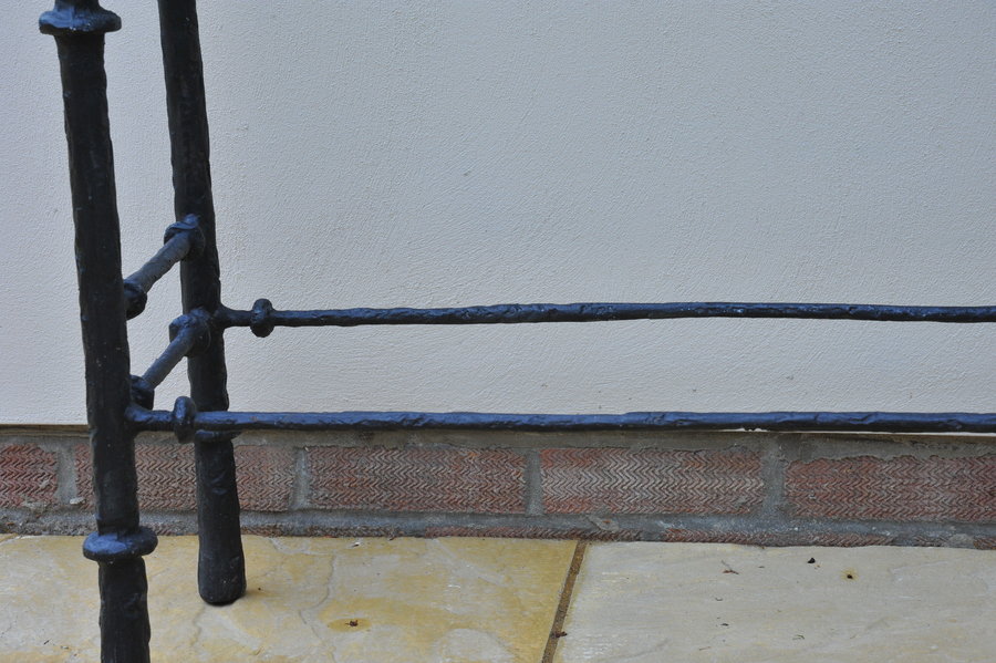 cast metal and glass giacommetti inspired console