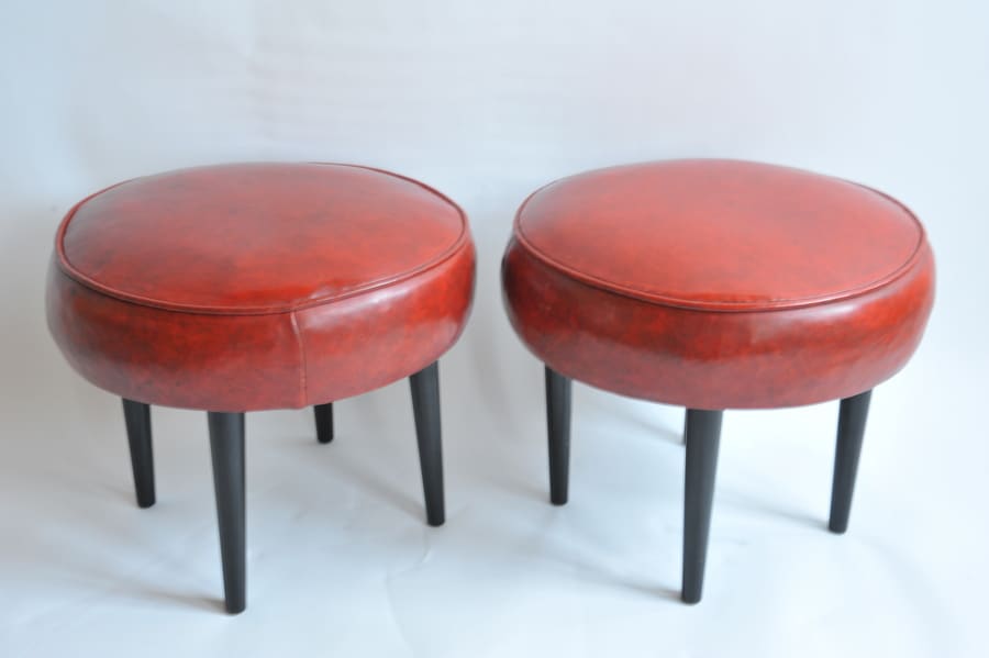 pair of vintage mid century upholstered foot stools