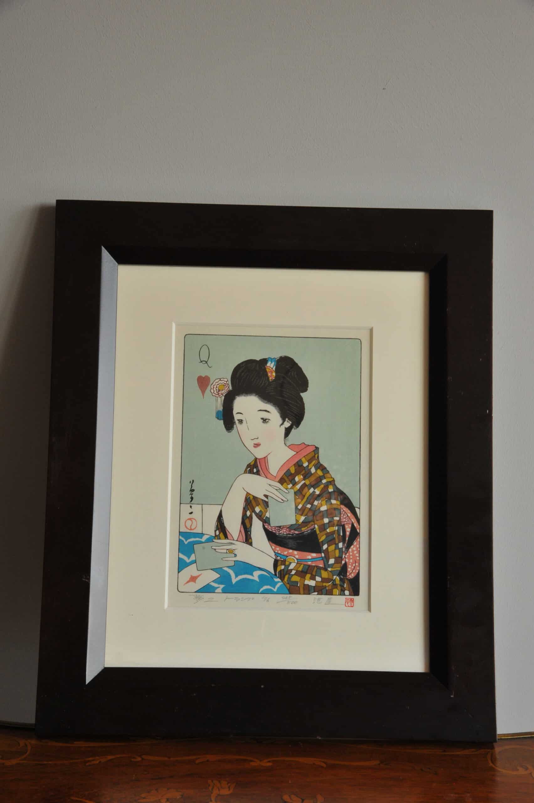 a pair of vintage japanese wood block prints