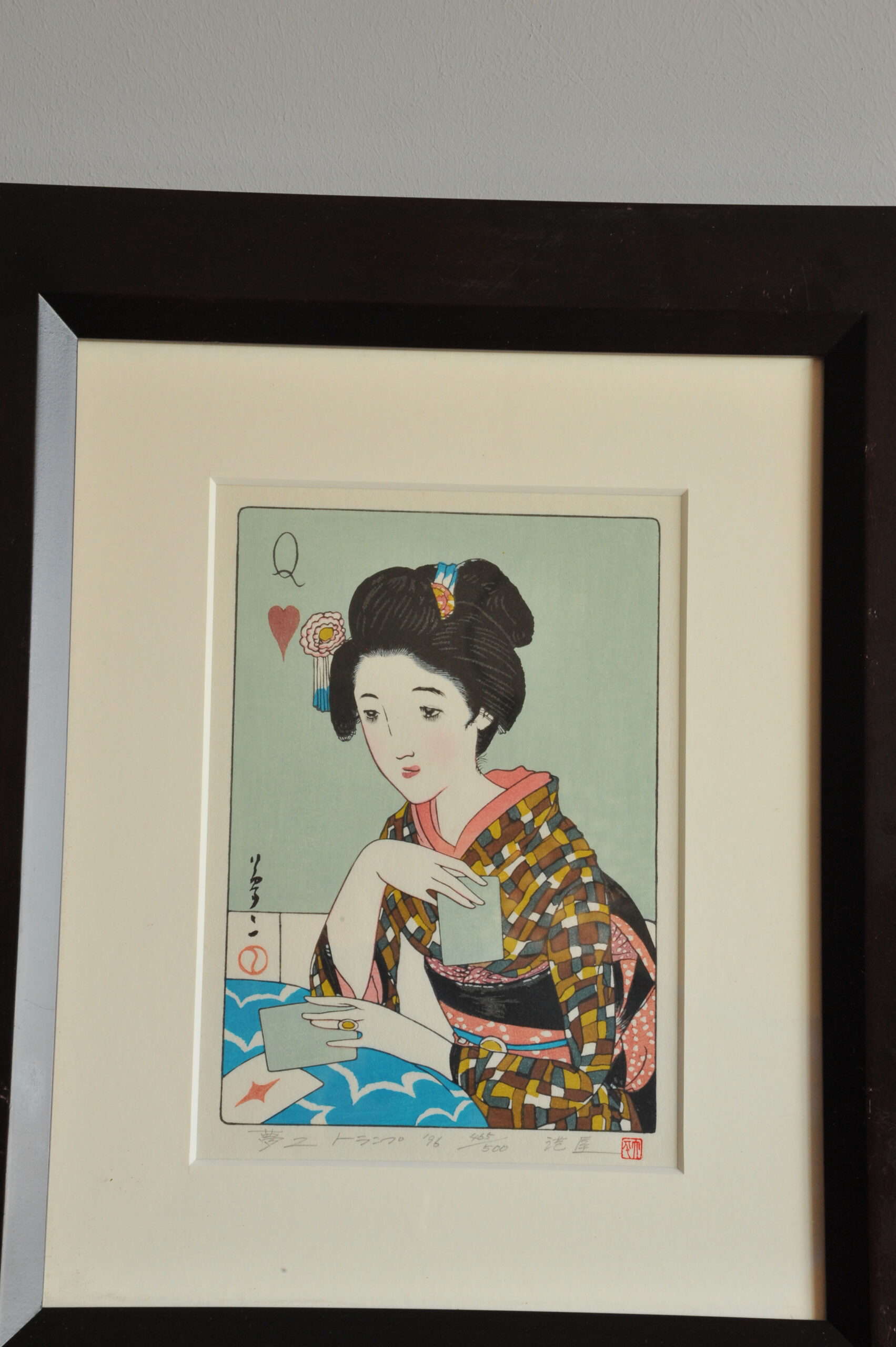 a pair of vintage japanese wood block prints