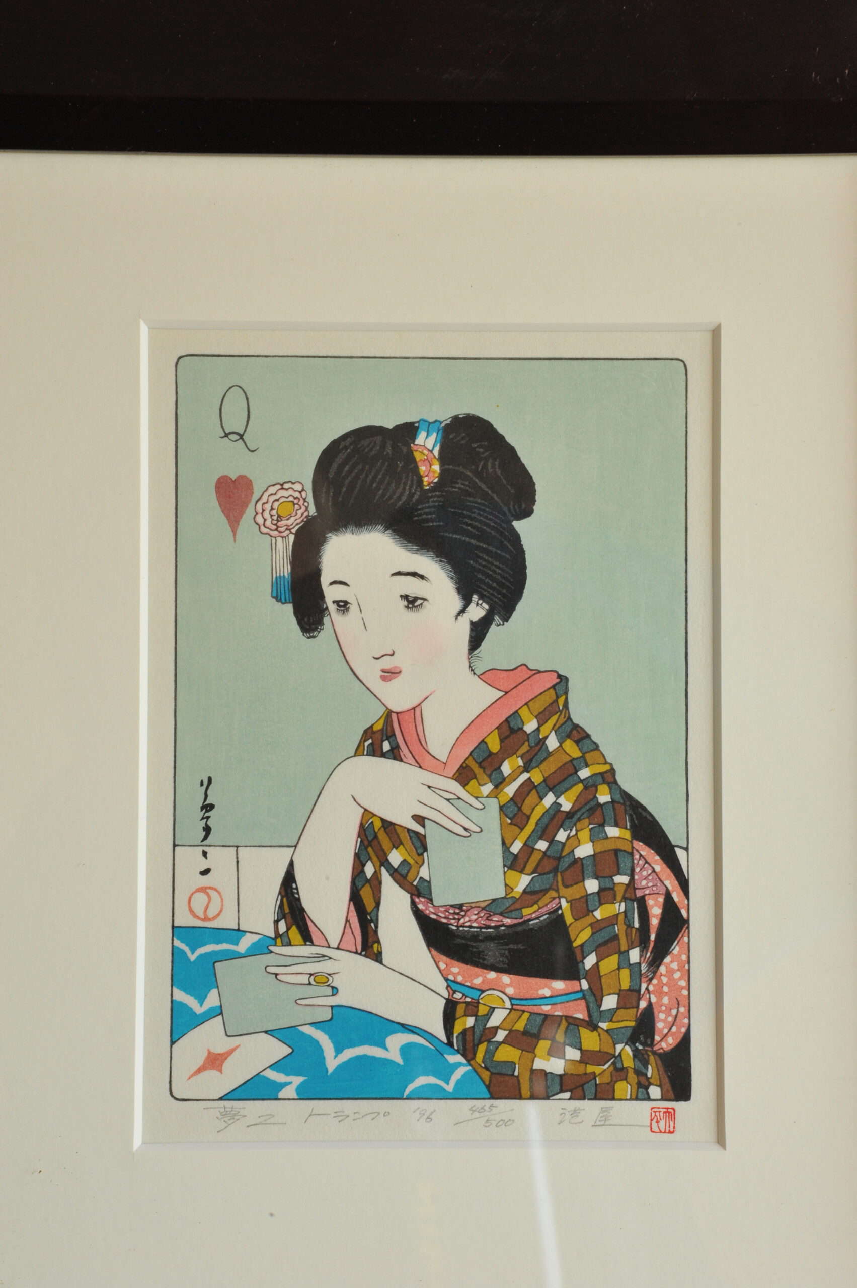 a pair of vintage japanese wood block prints