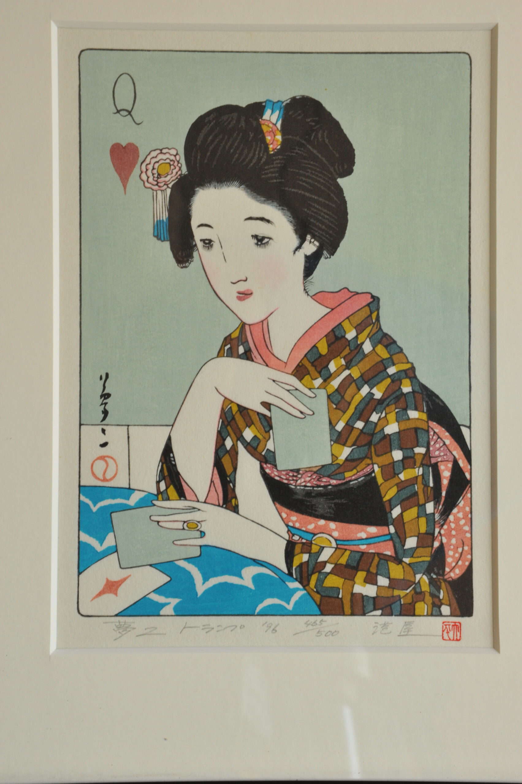 a pair of vintage japanese wood block prints