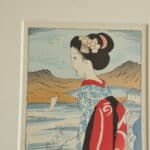 a pair of vintage japanese wood block prints