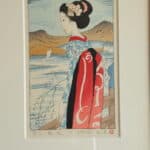 a pair of vintage japanese wood block prints