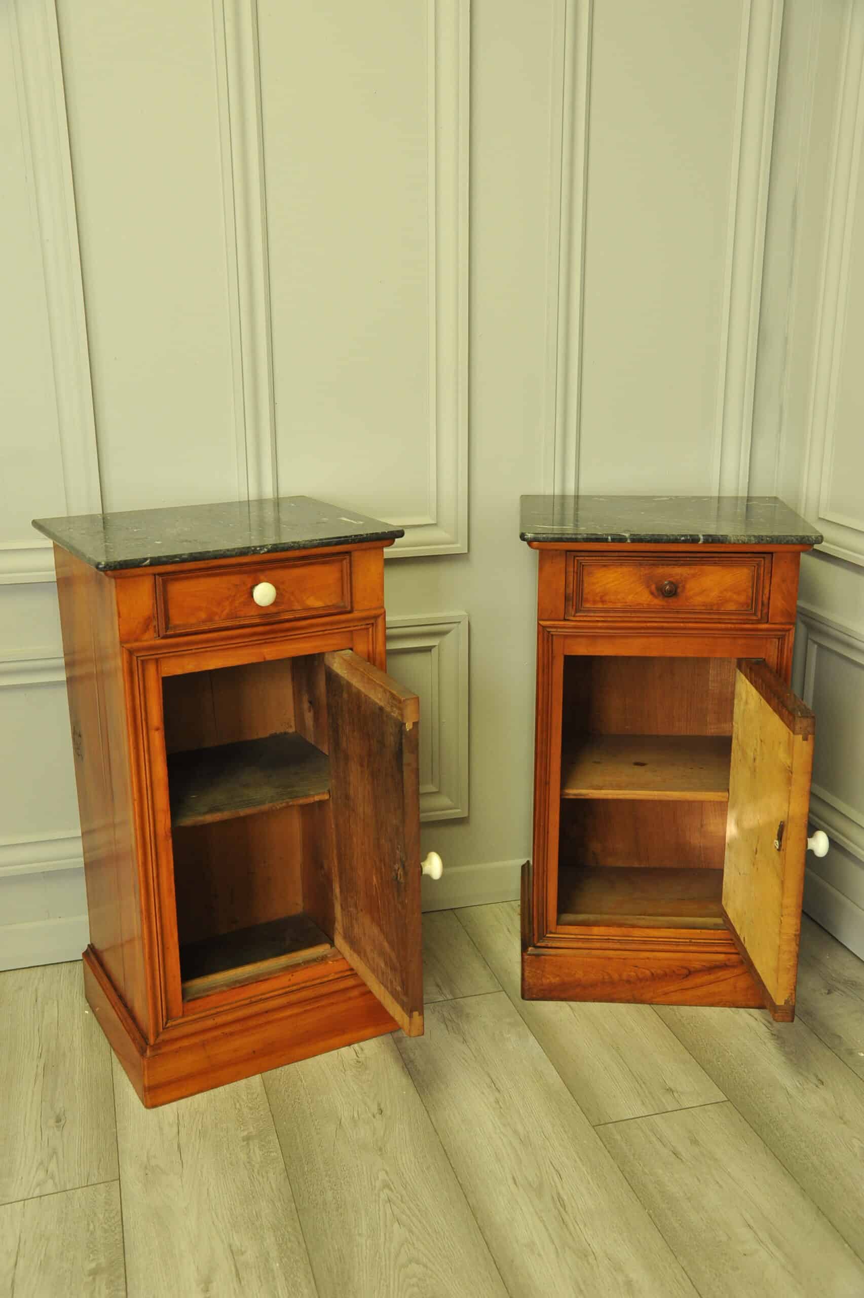 a pair of antique french walnut bedside cabinets
