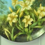 a beautiful vintage hand painted plate with lillies