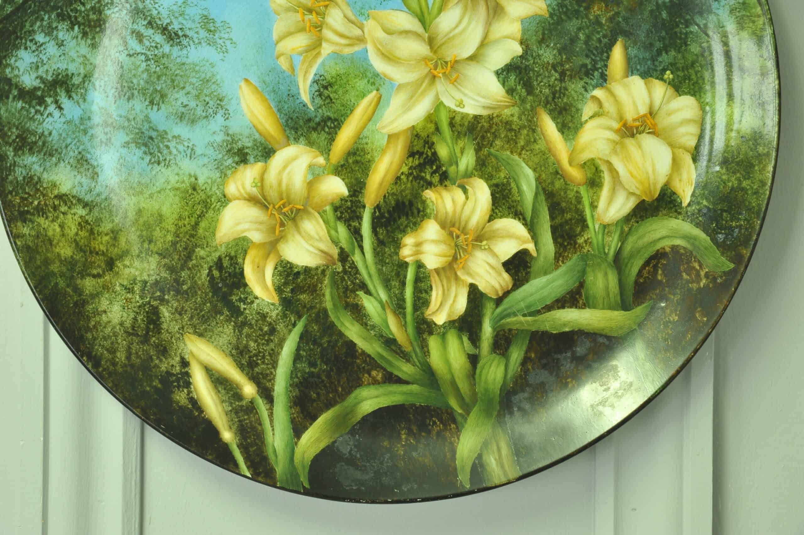 a beautiful vintage hand painted plate with lillies