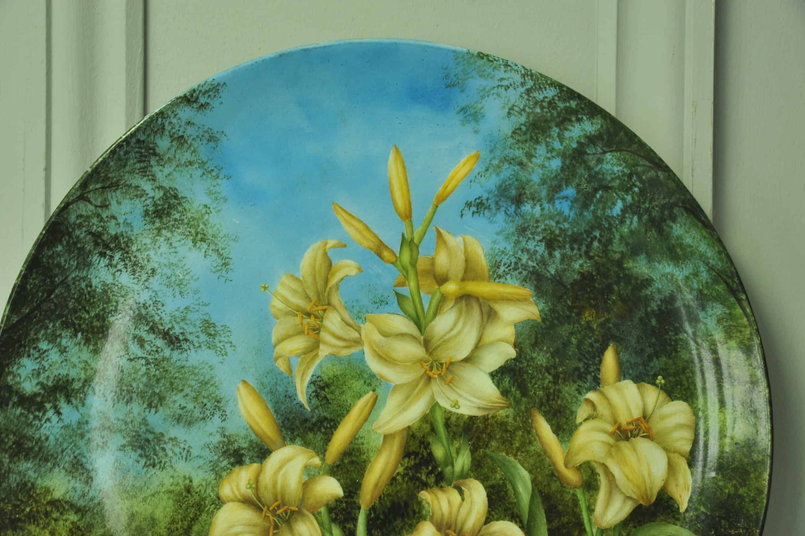 a beautiful vintage hand painted plate with lillies