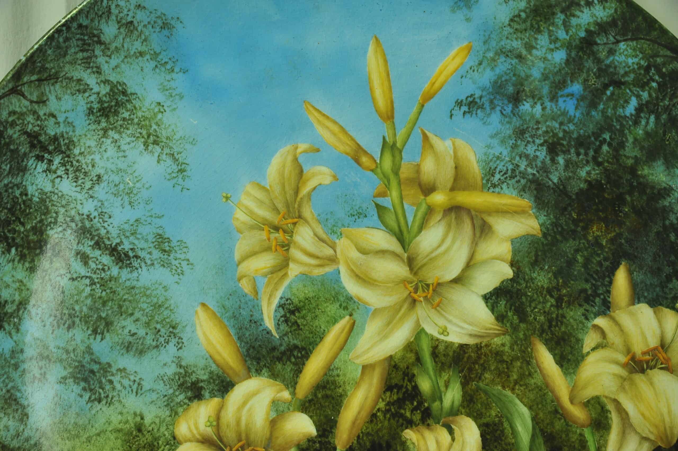 a beautiful vintage hand painted plate with lillies