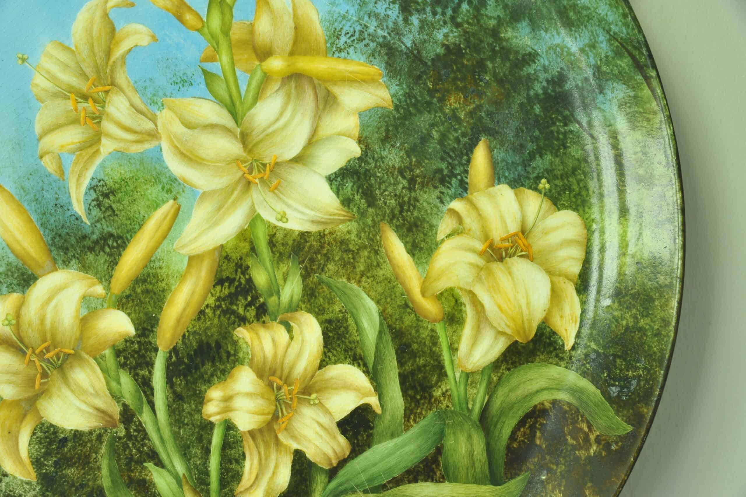 a beautiful vintage hand painted plate with lillies