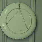 a beautiful vintage hand painted plate with lillies