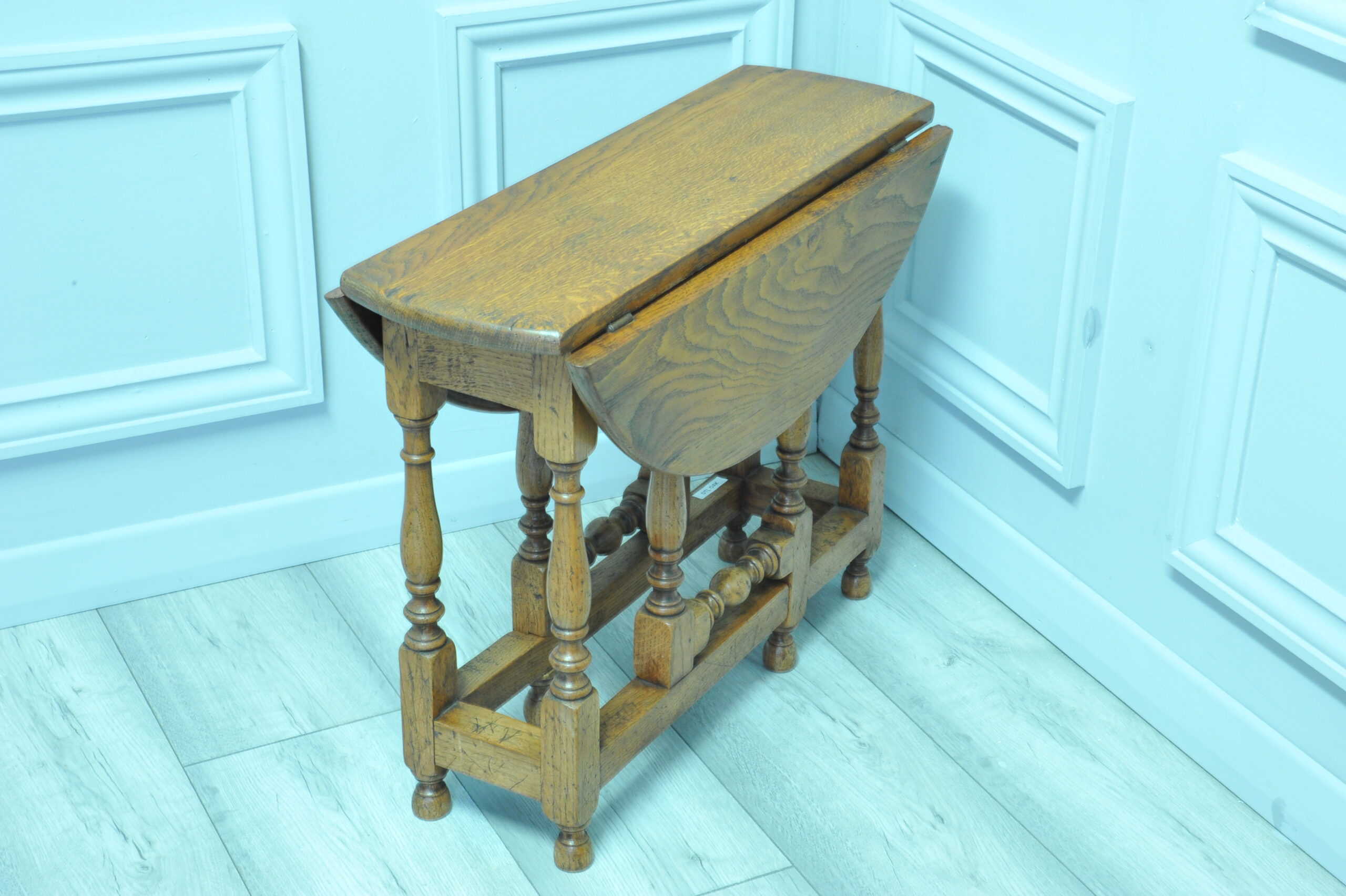 a very pretty small vintage oak gateleg table