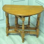 a very pretty small vintage oak gateleg table
