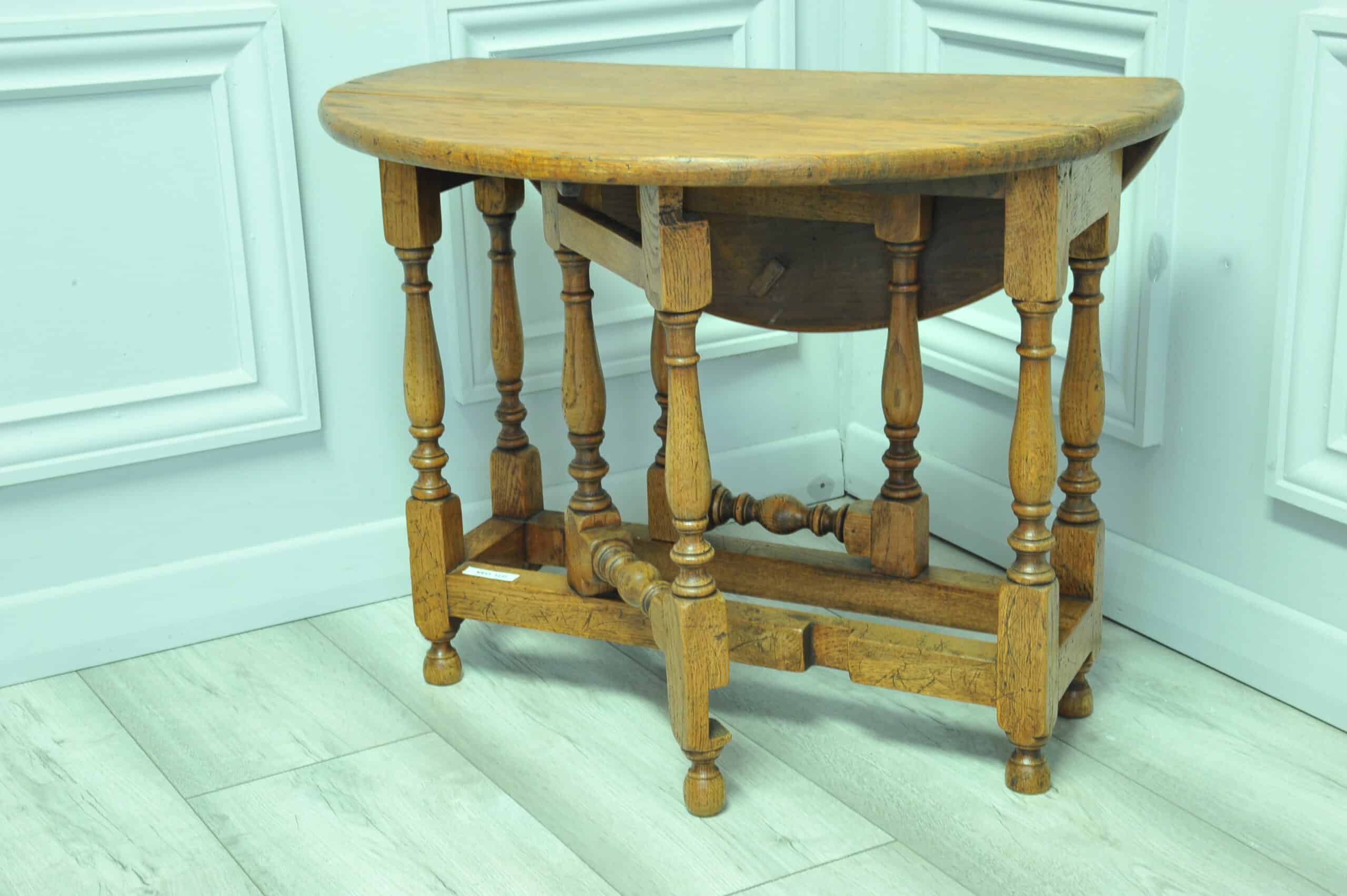 a very pretty small vintage oak gateleg table