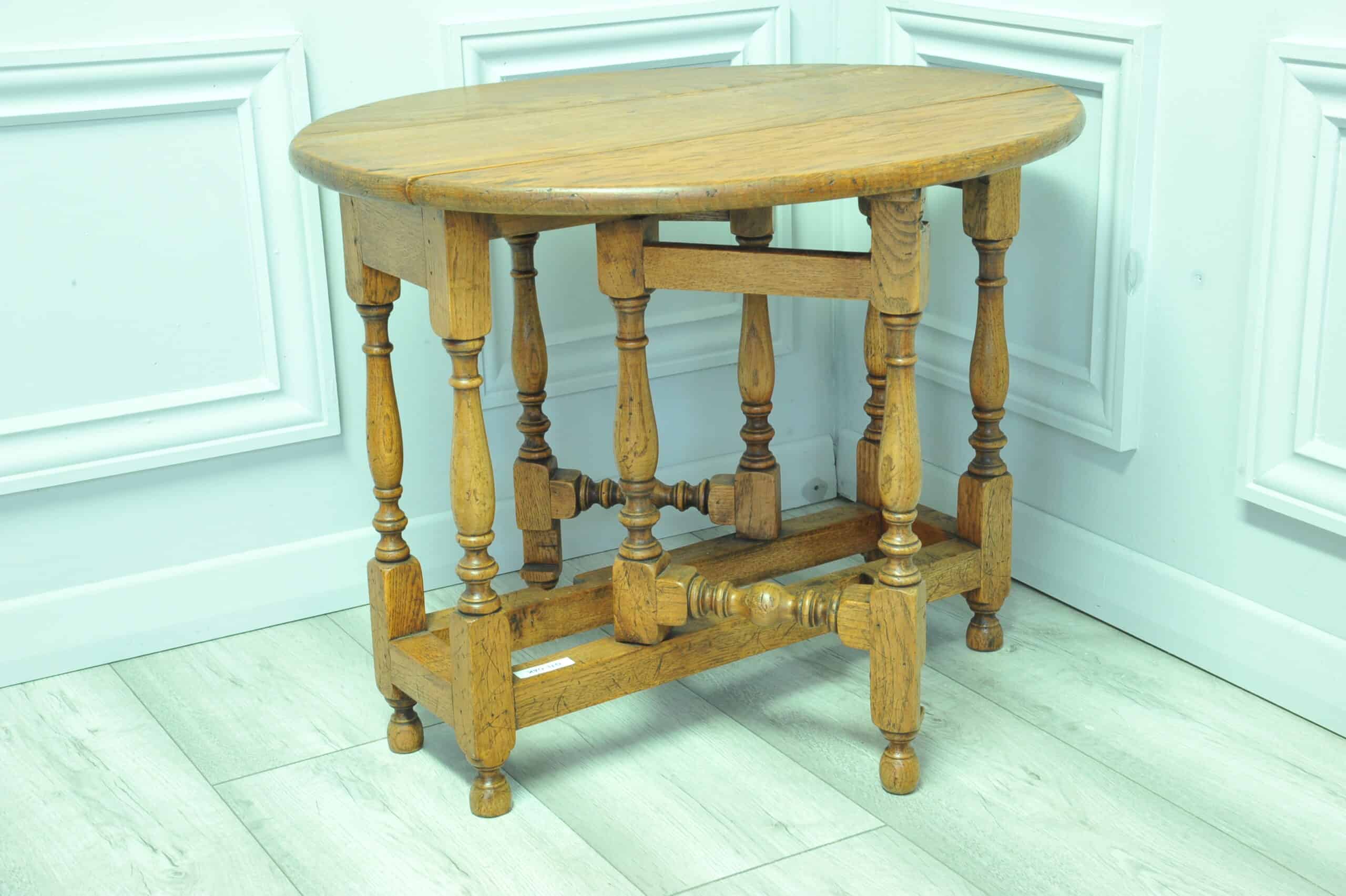 a very pretty small vintage oak gateleg table
