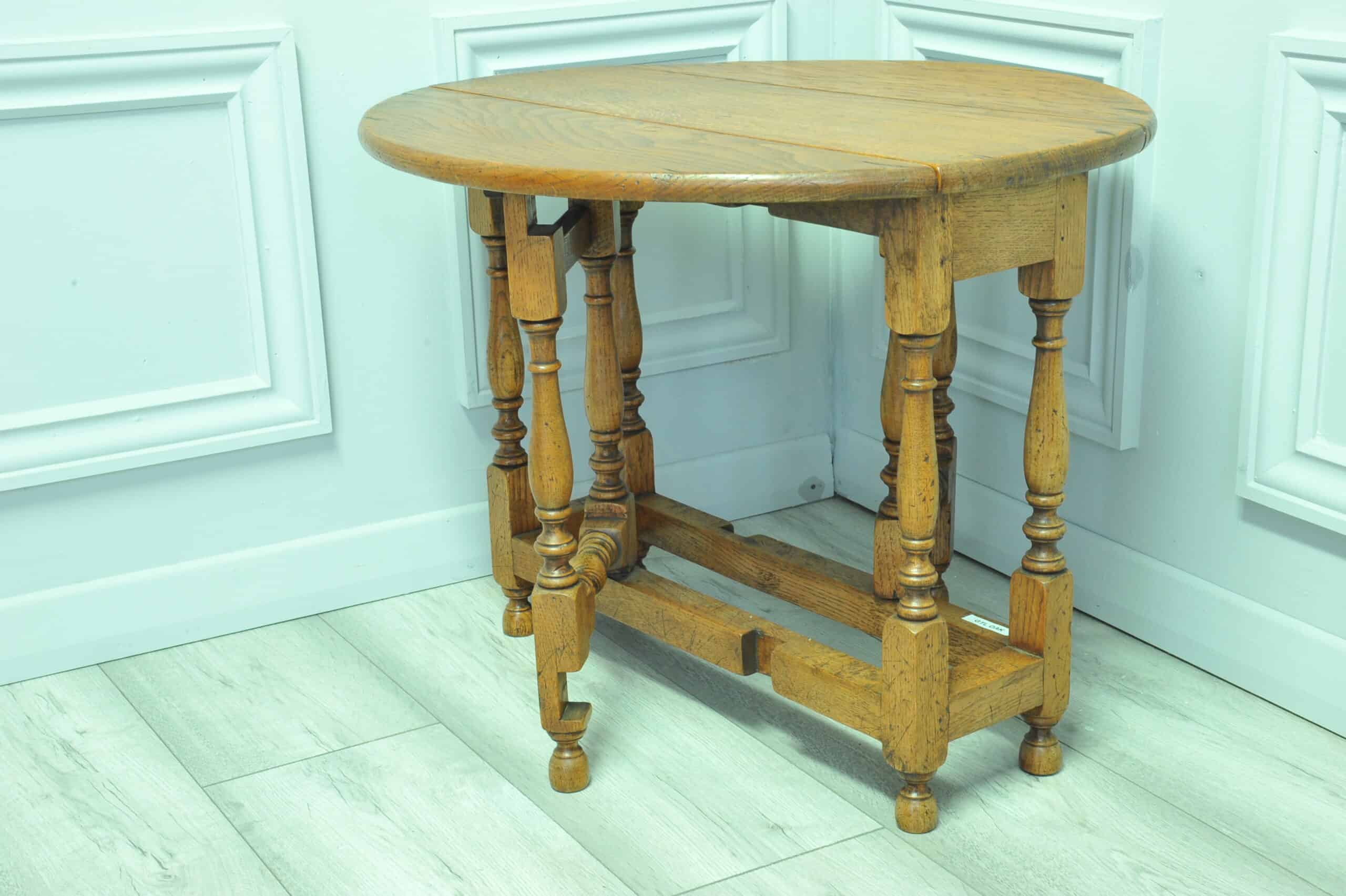 a very pretty small vintage oak gateleg table