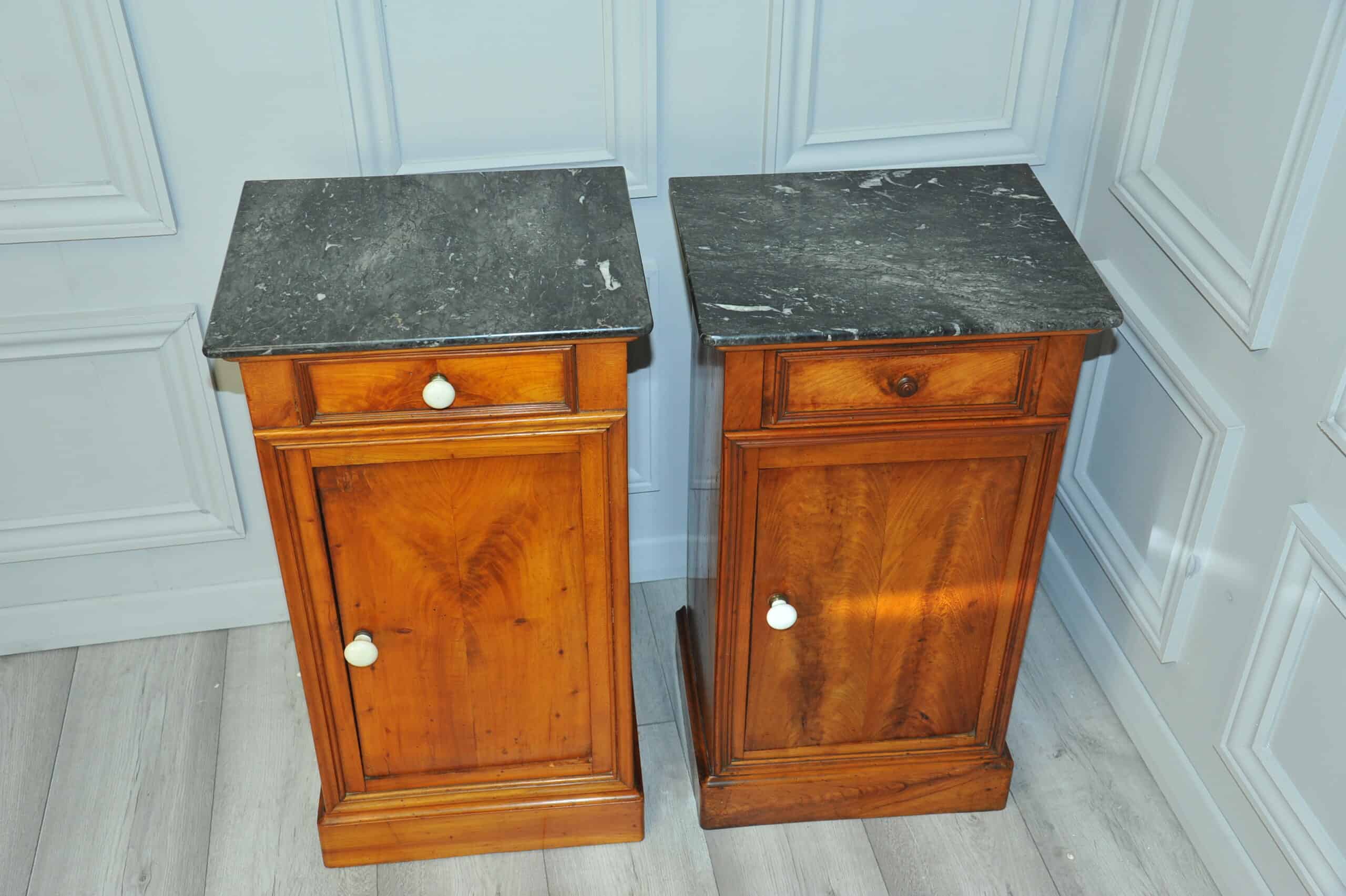 a pair of antique french walnut bedside cabinets