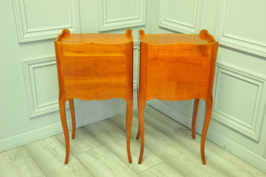 a lovely pair of mid c french satinwood bedside tables
