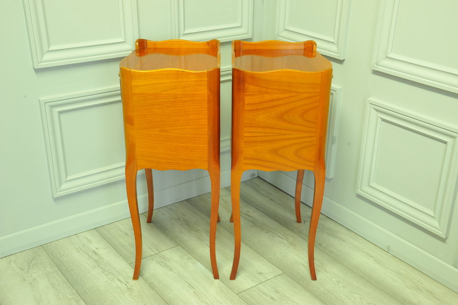 a lovely pair of mid c french satinwood bedside tables