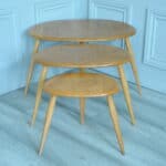 a vintage set of ercol pebble nesting tables