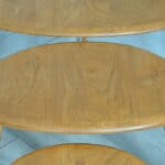 a vintage set of ercol pebble nesting tables