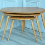 a vintage set of ercol pebble nesting tables