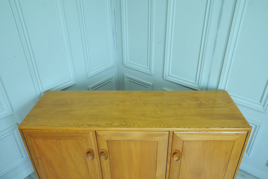 ercol three door sideboard
