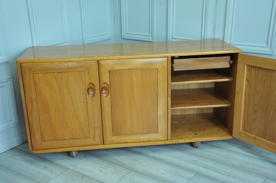 ercol three door sideboard