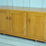 ercol three door sideboard